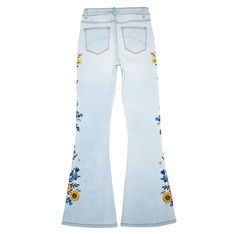 Add a floral flair to your denim rotation with these light blue jeans adorned with vibrant sunflower embroidery. The straight-leg cut provides a timeless silhouette, while the delicate flower detailing offers a fresh, feminine touch. These jeans are perfect for pairing with a simple crop top and clear strap heels for a look that's ready for weekend fun.Fabric name: denimMain fabric composition: cottonStyle: micro pantsPant length: trousersPopular element: pocketColor: light blueSize: S,M,L,XL,2XL,3XLTechnology: embroidery