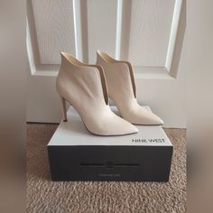 Stunning Ivory Leather Ankle Boots By Nine West. New, Size 9. Heel 4 Inches. Elegant Cream High Ankle Heeled Boots, Elegant High Ankle Cream Boots, Chic Cream Pointed Toe Boots, Chic Beige Pointed Toe Booties, Elegant Cream Ankle Heeled Boots, Elegant Cream Heeled Ankle Boots, Elegant Beige Booties For Fall, Cream High Ankle Leather Booties, Chic Cream Ankle Heeled Boots