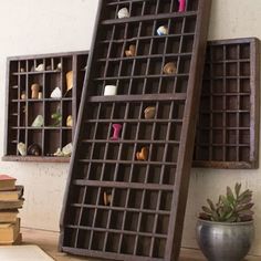 two bookshelves are stacked on top of each other