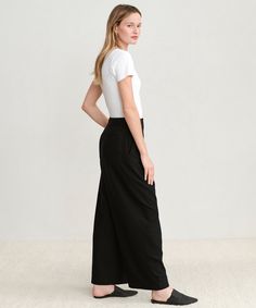 Relaxed Trouser Black Made from textural raw silk for an effortless look that's equally polished and comfortable. With tailored pleats that seamlessly transition into a wide-leg silhouette, the Relaxed Trouser is the definition of California cool. Pair it with a classic cami or tee or embrace an oversized aesthetic from head-to-toe with your favorite lightweight knit. 100% raw silk. Made in China. High-waisted, wide-leg pants with pleats. Elegant Wide Leg Viscose Bottoms, Elegant Full-length Viscose Bottoms, Elegant Full Length Viscose Bottoms, Elegant Viscose Wide Leg Pants For Work, Formal Viscose Wide Leg Pants, Classic Silk Wide Leg Pants, Elegant Viscose Wide Leg Pants For Summer, Elegant Relaxed Fit Viscose Bottoms, Chic Full-length Wide Leg Viscose Pants