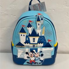 Disney Mickey Minnie Mini Backpack Loungefly Nwt Disneyland 65th Anniversary Blue Disney Backpack With Adjustable Strap, Disney Leather Backpack For Disney Trips, Blue Backpack For Theme Park, Blue Standard Backpack For Theme Park, Blue Disney Backpack With Zipper Closure, Disney Blue Bags With Zipper Closure, Blue Disney Bags With Zipper Closure, Blue Backpack With Zipper For Disney Trips, Disney Leather School Bags