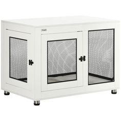 a white cabinet with mesh doors on the front