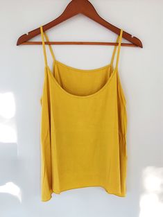 This amazing strap-y A-line tank is REVERSIBLE. Score! 1 tank, 2 ways to wear! Wear it tucked, as a layering piece, frontwards or 'reversed' for different looks. 100% Rayon Hand-wash cold Hang Dry Witch Fashion, Hanging Dryer, Dream Style, 2 Way, Layering Pieces, Camisole Top, Layering, Mango, Wear It