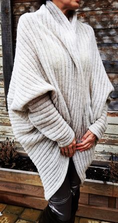 "Handmade cardigan. Pure merino wool. Loose fitting. Wear it with anything from jeans to a maxi dress. Woman in photo wearing \"light natural color\" cardigan. Wool's unique advantage is its breathability. That is it's ability to absorb and release moisture from the surrounding air, without compromising it's thermal efficiency. Wool does not support combustion and will extinguish itself in the event of fire Wool is natural, renewable and sustainable Such cardigan can be worn by people of every a