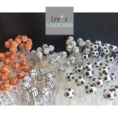 there are many soccer balls on top of the cake pops and lollipops