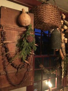 an assortment of items hanging from the ceiling in a room with wood and metal accents