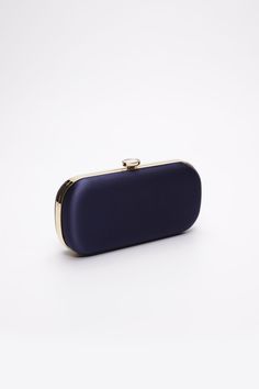 The Navy Bella Clutch is a custom designer clutch, and a timeless choice for an elegant wedding handbag. We’ve found your something blue… Your bridal purse. The Navy Bella Clutch is the perfect option for an evening wedding, as the duchess satin feels luxurious and sensible, without sacrificing style. Perhaps you’re celebrating on the New England coast at a chic hotel or private estate, complete your look with a stylish and elevated custom purse that you’ll love for years to come. The Bella Clut Elegant Rectangular Satin Bag, Elegant Satin Rectangular Bag, Classic Blue Evening Bag, Luxury Satin Bags For Formal Occasions, Luxury Silk Bags For Formal Occasions, Elegant Satin Clutch Bag, Classic Evening Bag For Parties, Elegant Rectangular Satin Evening Bag, Elegant Satin Rectangular Evening Bag