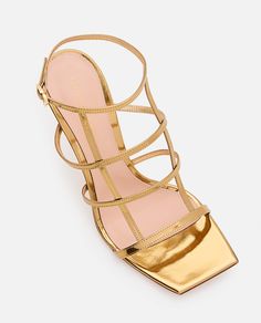 Square toe. Stiletto heel. Buckle ankle closure. Color: gold. Composition: 100% Calf Leather Rossi Shoes, Leather Heels Sandals, Gold Sandals, Designer Products, Footwear Design Women, Sneaker Wedge, Italian Luxury, Gianvito Rossi, Heel Sandals