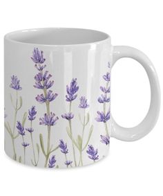 a coffee mug with lavender flowers painted on it