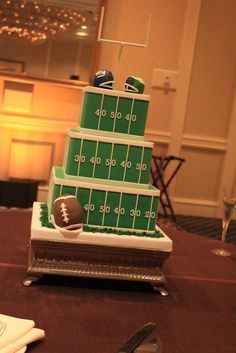 a football themed cake on a table