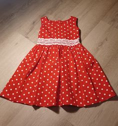 🎀 Welcome to our charming collection! 🎀 Introducing our adorable Toddler Red Polka Dot Dress, the perfect addition to your little one's wardrobe! Handcrafted with love and attention to detail, this delightful dress is sure to capture hearts wherever your little princess goes. 🌟 Features: 🔴 Vibrant Red Hue: Radiate joy and playfulness with the eye-catching red color of this dress. ⚪ Classic Polka Dot Pattern: Timeless and charming, the white polka dots add a touch of whimsy and style. 👗 Comf Cute Red A-line Dress, Polka Dot Summer Dress For Formal Occasions, Cute Polka Dot Dress-up Dresses, Cute Polka Dot Dress For Dress-up, Playful Polka Dot Fitted Dress, Cute Polka Dot Cotton Dress, Cute Red Cotton Dress, Playful Fitted Red Dress, Cute Red Holiday Dresses