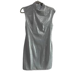 Prettylitttlethings A Touch Of Sparkle Silver Sequin Mini Figure-Hugging Fit, Product Type: Bodycon Dress Color: Silver Material: Sequin Mixture Size: 4 Neckline: High Neck Sleeves: Sleeveless Occasion: Evening / Date Night / Party Stretch Mini Dress For Evening Holiday Events, Sleeveless Mini Dress For Date Night Holiday, Fitted Sleeveless Dressy Dress For Party, Dressy Fitted Sleeveless Party Dress, Sleeveless Holiday Dresses For Date Night, Sleeveless Dresses For Date Night Holiday, Fitted Sleeveless Dress For Cocktail Holiday, Fitted Sleeveless Dress For Holiday Cocktails, Fitted Sleeveless Evening Dress For Holiday