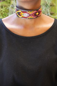 Handcrafted in Nairobi, Kenya. Choker is beaded on leather and a cord is used as a clasp. Choker length- 32cm Choker width- 3.3cm Colorful Choker, Nairobi Kenya, Maasai, Colourful Necklace, Nairobi, Casual Chic Style, Beaded Choker, Custom Rings, Chain Styles