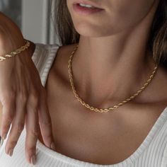 Dainty 3mm rope Chain 18k gold plated. Style this cool piece with a concert tee and denim for an edgy look. Product Details: Chain: L: 17.5" weight: 0.4 oz Category: Necklace  Finish: 18K Gold Plated Gem: None THE PERFECT GIFT 🎁 💝 All Marie Rose Bijoux jewels are packed in an elegant jewelry box and ready to give as a gift (If you want to). A note from you will be gladly added. Simply leave me a message with your personal note to include it in you package. CARE TIPS: Avoid the contact of your jewel with perfumes, creams, abrasive substances, excessive force and moisture. Store it in a dry place separately. The warranty covers manufacturing defects and not the bad handling of the jewel. You can also use a polishing cloth for bringing back the metal shine. --*--*--*--*--*--*--*--*--*--*--* Elegant Rope Chain Necklace, Elegant Formal Gold Chain Rope Necklace, Elegant Formal Gold Rope Chain Necklace, Elegant Rope Chain Link Jewelry, Gold Tarnish Resistant Rope Chain Necklace, Elegant Gold Tarnish Resistant Rope Chain Necklace, Elegant Twisted Gold Chain Necklace, Gold Plated Rope Chain Necklace, Elegant Rope Chain Link Necklace As Gift