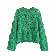 a green sweater with crocheted details on the shoulders and sleeves, sitting on a white background