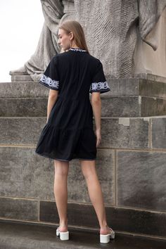 Crafted in an airy cotton with a notched V neckline and delicate contrast embroidery, this easy dress is equal parts classic and fresh. Pair with simple white sneakers and a crossbody for a casual warm-weather day, or with sandals and sunnies for your next getaway! Timeless and modern, it’s a must-have as you refresh your wardrobe. 100% cotton dress. Gently a-lines below the waist and features gentle tiers. On seam pockets. Flattering V neckline with embroidered collar. Lined. Embroidery through Summer Knee-length Embroidered Dress For Daywear, Chic Cotton Dresses With Cutwork Hem, Chic Cotton Dress With Cutwork Hem, Embroidered Cotton Dress For Day Out, Chic Beach Dress With Cutwork Hem, Chic Beach Dresses With Cutwork Hem, Summer V-neck Dress With Embroidered Hem, Chic Dresses With Cutwork Hem For Beach, Casual Dresses With Cutwork Hem