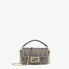 Small, ionic Baguette bag embroidered with over 5800 grey bugle beads creating a herringbone motif. Trimmed with tone on tone calfskin and decorated with an FF clasp embellished with crystals. Featuring a front flap, magnetic clasp, satin-lined internal compartment with a calfskin pocket and palladium-finish metalware. The bag can be carried by hand or worn either on the shoulder or cross-body thanks to the handle and chain shoulder strap, both detachable. Made in Italy. One Size Fendi Baguette Mini, Fendi Baguette, Tone On Tone, Clutch Pouch, Baguette Bag, Embroidered Bag, Bugle Beads, Boot Accessories, Boston Bag