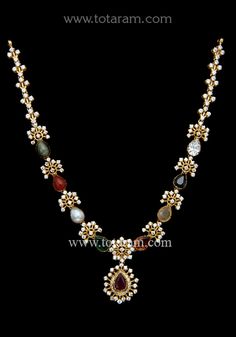 22 karat gold necklace with navrathan stones & cz 
  
    note: this item does not have a diamond in it, the white stone shown is a cz.
  necklace has 8 precious stones which include ruby, emerald, coral, pearl, cats eye, garnet, yellow saphire & blue saphire. - 235-GN4368 - in 25.050 Grams for USD $3,087.76 USD. 
Made in India by Totaram Jewelers Online this product is in Gold - 22 Karat BIS Hallmark 916 Gold  & is an excellent gift for Adult - Women. Ships fully insured with secured guaranteed 22k Gold Necklace With Stone Work As Gift, 22k Gold Temple Necklace With Gemstones, Traditional Multi-stone 22k Gold Necklace, Elegant Gold Multi-stone Temple Necklace, 22k Gold Multi-stone Temple Necklace, 22k Gold Necklace, Antique Jewelry Indian, Ruby Emerald, Cz Necklace