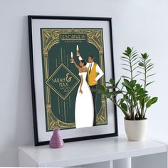 an art deco poster hangs on the wall next to a potted houseplant