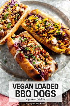 two vegan loaded bbq dogs on a plate