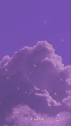 the sky is full of stars and some clouds are in the foreground with purple hues