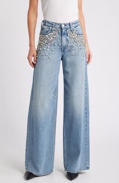 Hand-sewn jewels cascade from the front pockets on these high-waisted jeans crafted from lightweight denim in a wide-leg silhouette. 32" inseam; 25" leg opening; 12 1/4" front rise; 15" back rise (size 29) Zip fly with button closure Five-pocket style 61% cotton, 39% Tencel® lyocell Tencel lyocell is a more-sustainably produced fiber made with closed-loop processing Hand wash, line dry Imported High Waist Wide Leg Jeans, Jean Crafts, Trendy Jeans, Painted Jeans, Rag & Bone, Wide Leg Jeans, Bottoms Pants, Hand Sewn, High Waist Jeans