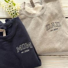 best gifts for mom, baby announcement, gift for grandma, christmas gift, mothers day, gift for mom, mom sweatshirt, mama sweatshirt, grandma sweatshirt, embroidered gift, new mom PRODUCT AND BRAND DETAILS ➤ Gildan ® brand ➤ Unisex & Classic fit ➤ 8 oz./yd² (US) 13.3 oz./L yd (CA), 50/50 cotton/polyester, 20 singles - Heather Sport colors are 60/40 polyester/cotton PERSONALIZED GUIDE: Custom sweatshirts, hoodies, and tees will usually have four embroidery positions: ➤On the chest: Left chest (above the heart), right chest, middle chest. ➤On the sleeve: Left sleeve or right sleeve (you can customize both, one side is free). ➤On the back of the shirt: In the middle. ➤In the hood for hoodies. If you want to embroider any of these positions, please place an order and let us know in the Personal Long Sleeve Cotton Sweatshirt For Anniversary, Father's Day White Sweatshirt Gift, Father's Day Crew Neck Sweatshirt As Gift, Family Matching Letter Print Sweatshirt As Gift, Father's Day Gift Crew Neck Sweatshirt, Family Matching Sweatshirt With Letter Print As Gift, Family Matching Sweatshirt With Letter Print, Father's Day Casual Sweatshirt Gift, Family Matching Cotton Sweatshirt With Custom Text