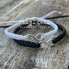 These lovely bracelets are made with white waterproof cord and solid sterling silver infinity charms Made in the USA. Designed for couples. Both bracelets are adjustable. Includes Gift Box.