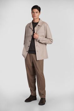 Oasi overshirt Casual jacket in beige cashmere, cuban collar, long sleeves, frontal buttoning, flap pockets, straight hem, 100% cashmere, Made in Turkey, Model is 183 cm and wears size L Classic Outerwear With Straight Hem And Concealed Placket, Classic Outerwear With Concealed Placket And Straight Hem, Classic Utility Jacket With Relaxed Fit And Long Sleeves, Classic Long Sleeve Utility Jacket With Relaxed Fit, Classic Long Sleeve Relaxed Fit Utility Jacket, Classic Long Sleeve Wool Shacket, Beige Long Sleeve Outerwear With Flap Pockets, Beige Relaxed Fit Outerwear With Lapel Collar, Collared Beige Blazer For Business Casual