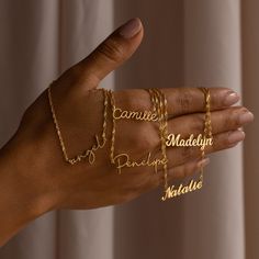 "S I N G A P O R E ∙ C H A I N ∙ N A M E ∙ N E C K L A C E Customize this nameplate necklace to anything your heart desires. Personalized to a name or word of your choosing- this is the perfect gift for a Bridesmaid Proposal, to memorialize an inside joke between friends, or help to keep someone special close. * Material: High Quality Solid 925 Sterling Silver * Finish: Sterling Silver ∙ 18K Gold ∙ Rose Gold * Dimensions: Depending on your font choice, height sizes range from 3mm to 4mm lowercas Custom Gold Jewelry, Jewelry Stack, Necklace Chain Types, Necklace Stack, Gold Water, Nameplate Necklace, Gold Name Necklace, Rose Gold Chain, Stacked Jewelry