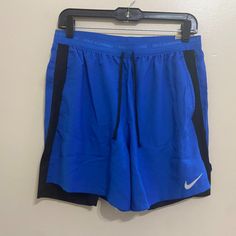 Nike Men's Dri-Fit Stride 2-In-1 Blue Running 5” Shorts Dm4757-480 Size M New Nike Blue Activewear With Built-in Shorts, Functional Blue Shorts For Running, Blue Bottoms With Built-in Shorts For Running, Blue Athletic Shorts With Go-dry For Running, Blue Go-dry Athletic Shorts For Running, Blue Nike Athletic Shorts For Gym, Functional Blue Shorts With Go-dry Technology, Blue Go-dry Shorts For Sports, Blue Sports Shorts With Pockets