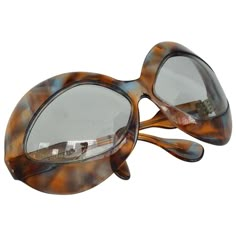 Pierre Marly cocktail sunglasses with a futuristic, avant-garde, oversized tortoiseshell frame. Made In France. Measures: Hinge to hinge 5.25" Eye frame height 2.69" Arm length 4". Big Sunglasses Women, Quirky Glasses, Creative Sunglasses, Translucent Sunglasses, 60s Jewelry, Big Glasses, Funky Glasses, Sunglasses Oversized, Big Sunglasses