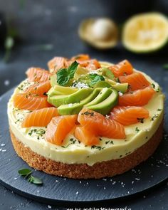 there is a cake that has salmon and avocado on it