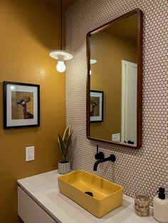 modern and moody ochre bathroom design with yellow ceiling, white penny tile and yellow concrete sink Mustard And Black Bathroom, Toilet Ceiling Ideas, Bathroom Mustard Yellow, Yellow Modern Bathroom, Yellow Floor Bathroom, Yellow Brown Bathroom, Yellow Ceiling Bathroom, Mustard Tile Bathroom, Mustard Bathroom Ideas