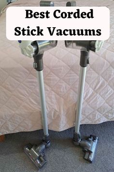 two vacuums with the words best corded stick vacuums on them in front of a bed