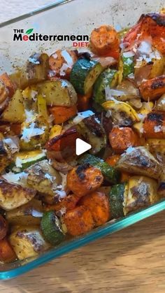 a glass casserole dish filled with vegetables