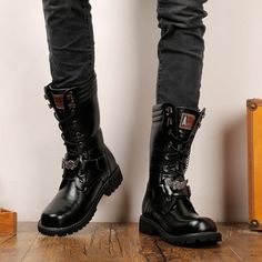 The footwear of Skull Boots Military is indispensable for all music fans. A demonic look and a wild rhythm, it's all there on this Skull Cross Boots! This pair of Skull military boots is a beautiful pair of shoes, suitable for both men and women, they will look great with a proper outfit. The footwear of these high boots is indispensable for all rock music fans and skull lovers, a demonic look with a wild rhythm, it’s all there with these new boots ! All black with nice details and a very comfor Punk Style Moto Boots With Metal Feet For Winter, Punk Moto Boots With Metal Feet For Winter, Punk High Ankle Martin Boots For Concert, Winter Punk Boots With Metal Feet, Winter Punk Boots With Metallic Accents, Gothic Leather Combat Boots For Streetwear, Punk Combat Boots With Rivets For Winter, Rock Style Leather Boots For Concerts, Punk Style Rivets Combat Boots For Winter