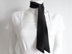 Unisex black satin scarf / sash for a fashionable modern style. Say hello to your new hair obsession.  Many wearable variations such as hair scarf, wrist scarf, sash belt, neck scarf, purse or hat scarf... Wrap around a low / high hair bun, ponytail or twine in a stylish braid.   Add a bowknot neck scarf or a satin sash belt to accessorize your outfit for that unique finishing touch.  A must-have versatile scarf that is a perfect statement accessory for any social event, wedding or everyday casu Black Scarf Aesthetic, Elegant Black Tie Scarf, Classic Black Silk Scarf For Work, Elegant Silk Scarf With Ties For Work, Elegant Workwear Scarves With Ties, Elegant Workwear Scarf With Ties, Elegant Black Silk Scarf For Party, Formal Solid Color Satin Scarves, Elegant Black Silk Party Scarf