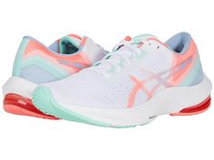 the asics running shoe is white and pink