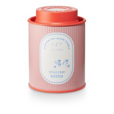 a pink canister with an orange lid and white lettering on the front, sitting in front of a white background