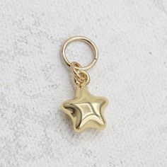 Charm necklaces often allow wearers to express their individuality and interests. The charms can represent hobbies, passions, or personal milestones, making each necklace unique to its owner. 18K gold filled charm 5mm X 8mm Ceramic Jewelry Dish, Room Studio, Popular Gifts, Glam Room, Necklace Unique, Ceramic Jewelry, Jewelry Dish, Charm Set, Star Charms