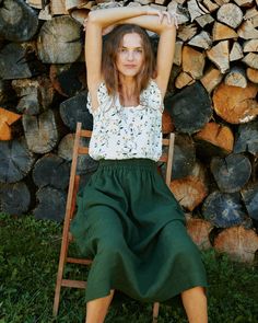 Comfortable, gathered, a-line, midi-length skirt with an elastic waistband. And...drumroll please...it has pockets! SION makes for a feminine and effortless look when paired with a tee or tank, and any of your well-loved heels, sneakers, clogs, flats, or sandals. Model wears a skirt in juniper green, paired with VARENNA BUTTONS top in sunny field. Summer Skirt With Gathered Waist And Relaxed Fit, Linen Skirt With Elastic Waistband For Day Out, Summer Linen Skirt With Elastic Waistband, Flowy Linen Maxi Skirt For Day Out, Summer Linen Maxi Skirt With Elastic Waistband, Summer Linen Voluminous Maxi Skirt, Linen Maxi Skirt With Elastic Waistband, Summer Voluminous Linen Maxi Skirt, Linen Tiered Maxi Skirt With Elastic Waistband