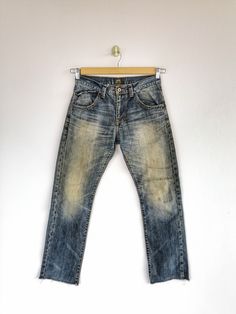 Vintage Rusty Lee Sanforized Denim Jeans Pants - BS45931.  Manual Measurement (Laying Flat):  1) Waist: 31 inch.  2) Rise: 10 inch.  3) Hip: 20.5 inch.  4) Tight: 11.5 inch.  5) Outseam: 39 Inch.  6) Inseam: 30 Inch.  7) Leg Opening: 7.5 inch.  Please check measurements to insure a proper fit. Remember to allow yourself some extra room for movement.  You can compare these with something from your closet that fits you well. Condition: Good Vintage Condition.  Fabric Material: 100% Cotton.  BS45931.  We do combine shipping.  Please Read Before Purchase. Drop your phone number. Tracking number can be tracked 3 - 5 days after shipment process. Please be patient waiting. This design and style by wearing it increases your confidence. All pieces are measured inches while laying flat. This is used Grunge Style Straight Leg Medium Wash Bottoms, Grunge Style Straight Leg Medium Wash Jeans, Grunge Denim Straight Leg Pants, Grunge Straight Leg Medium Wash Jeans, Grunge Style Straight Leg Jeans In Medium Wash, Grunge Straight Leg Bottoms With Belt Loops, Grunge Straight Leg Denim Pants, Grunge Straight Leg Washed Jeans, Dark Wash Straight Leg Grunge Jeans