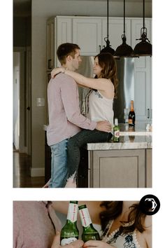 a man and woman standing next to each other in a kitchen with bottles on the counter