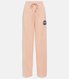 GG embroidered cotton jersey sweatpants in pink - Gucci | Mytheresa Gucci Casual Loungewear Bottoms, Cotton Joggers With Drawstring, Sporty Cotton Sweatpants With Logo Detail, Athleisure Cotton Bottoms With Logo Detail, Casual Gucci Pants With Pockets, Casual Gucci Cotton Bottoms, Athleisure Cotton Pants With Logo Detail, Cotton Bottoms With Logo Detail And Relaxed Fit, Sporty Cotton Bottoms With Logo Detail