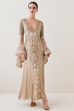 This Is A Limited Edition Piece, Created As One Of Just 150 Styles. Embellished Floor-length Gown For Gala, Festive V-neck Wedding Dress, V-neck Sequin Dress For Reception, Sequin V-neck Dress For Reception, Dressy Embellished Dresses For Gala, Glamorous V-neck Dress For Wedding Guest, Maxi Length Sequined Evening Dress For Reception, Embellished Gown For Gala, Gala Embellished Gown