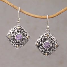 Shining openwork swirl motifs decorate these Balinese dangle earrings crafted of sterling silver by local artisans. They accent the corners with 18k gold surrounding sparkling amethyst stones in the centers. Accentuating any outfit these earrings are presented by Kadek Wijanegara. Fillagree Jewelry, Labradorite Earrings, Silver Dangle Earrings, Sterling Silver Dangle Earrings, Gold Accent, Gem Stones, Floral Earrings, Silver Earrings Dangle, Earrings Dangle