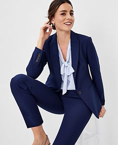 Refined four-way stretch holds its shape while flattering yours - so you stay polished and comfortable from A.M. to P.M. Peaked lapel. Long button-open sleeves allow for versatility in styling. One button front. Front besom pockets. Back vent.,Bullet3:24 1/2" long,Hit:Hits at hip,Imported:Imported,Fit:Tailored fit,Fabrication:Shell: 66% Polyester, 28% Rayon, 6% Spandex; Lining: 100% Polyester,Garment Care:Machine Washable The Petite Long One Button Blazer in Bi-Stretch by Ann Taylor Size petite Express Suits For Women, Boss Lady Attire, Womens Suits Business Petite, Navy Blue Woman Suit, Womens Blazer Work Outfit, Women’s Navy Suit Outfit, Women Navy Suit Outfit, Women’s Navy Blue Suit, Women’s Fitted Suit