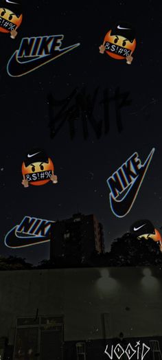 the nike logo is projected in the night sky