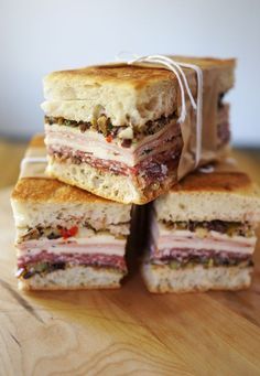 several sandwiches stacked on top of each other